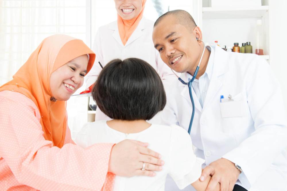 Doctors are comforting a patient