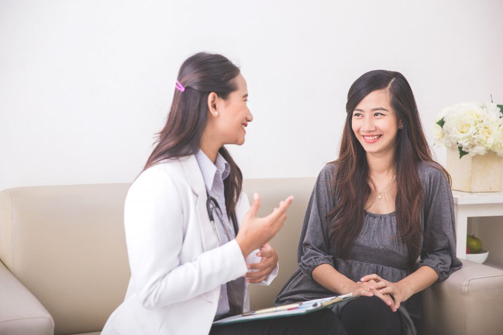 A female doctor and her female patient.
